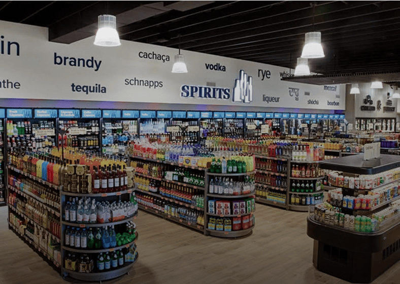 Liquor store interior with various spirits displayed.