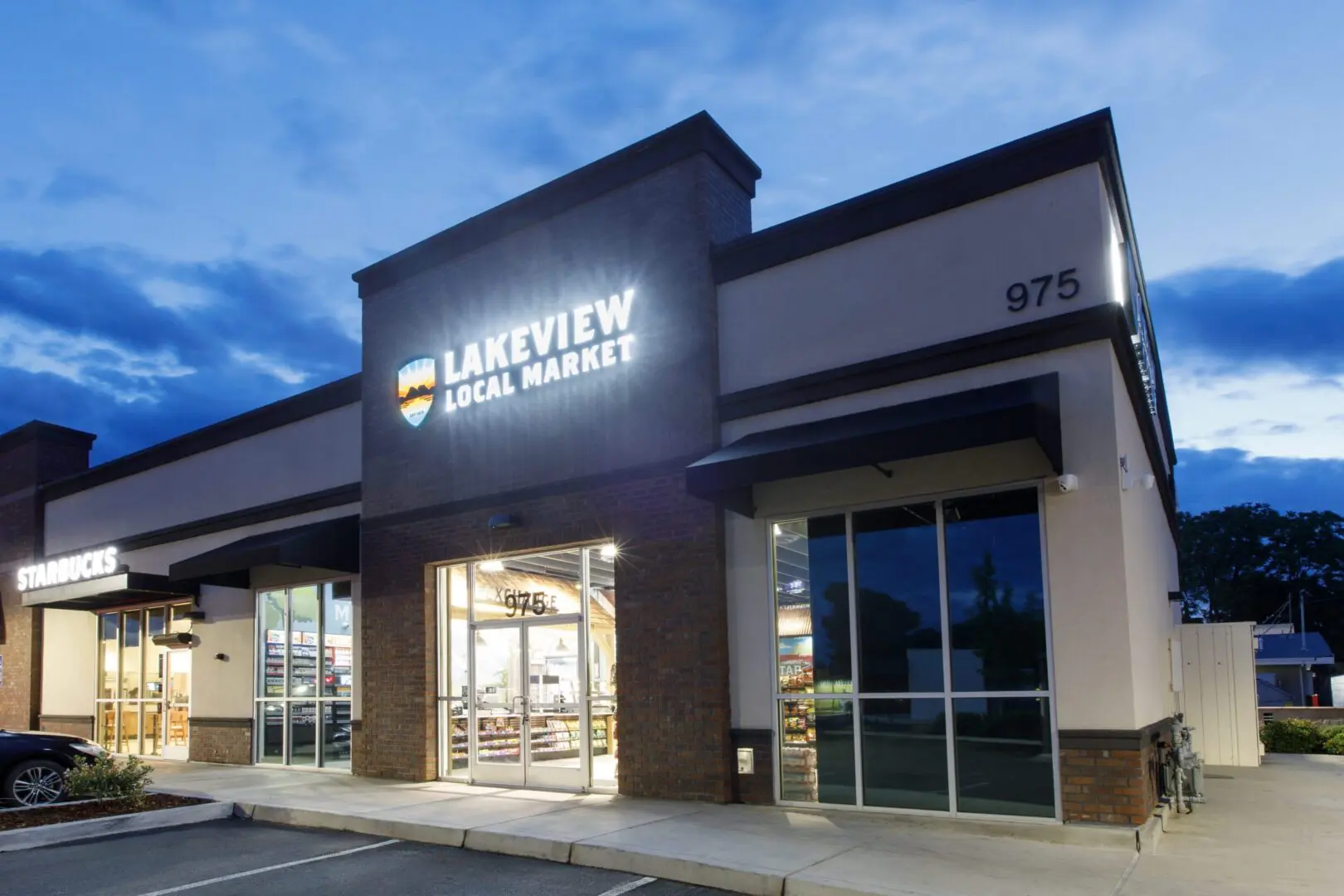 Illuminated store entrance evening view
